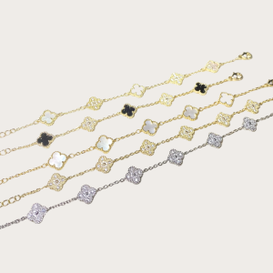 Gold and silver bracelet with clover charms in various colors