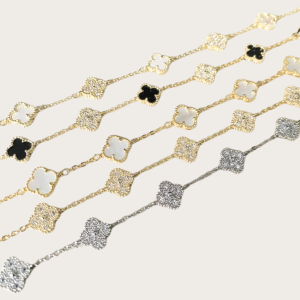 Gold and silver bracelet with clover charms in various colors