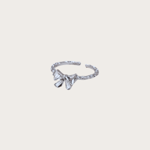 Adela Bow Ring in silver with a sparkling zircon bow, perfect for elegant styling.